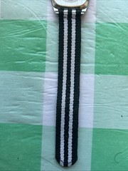 Women’s Silver Tone Black And White Band Quartz Watch