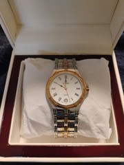 Cyma le Locle Men’s Sapphire Crystal Watch. Stainless Steel And 18k Gold Bezel