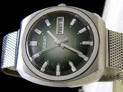 Orient UNIMATIC 37mm analog watch used