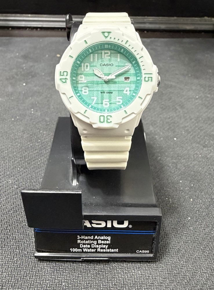 Casio LRW-200H White Green Plaid Dial Analog Date Watch Rotating Bezel w Stand