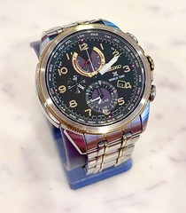 Seiko Men’s Solar World Time Two Tone Stainless Steel & Gold Watch V195-0AD0