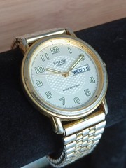 Sharp Quartz Watch Unisex Silver Gold Tone Day/ Date Indicator In Eng And Span