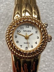 Gruen Gold Tone Woman’s Wristwatch Quartz Hinged Cuff Bracelet New Battery