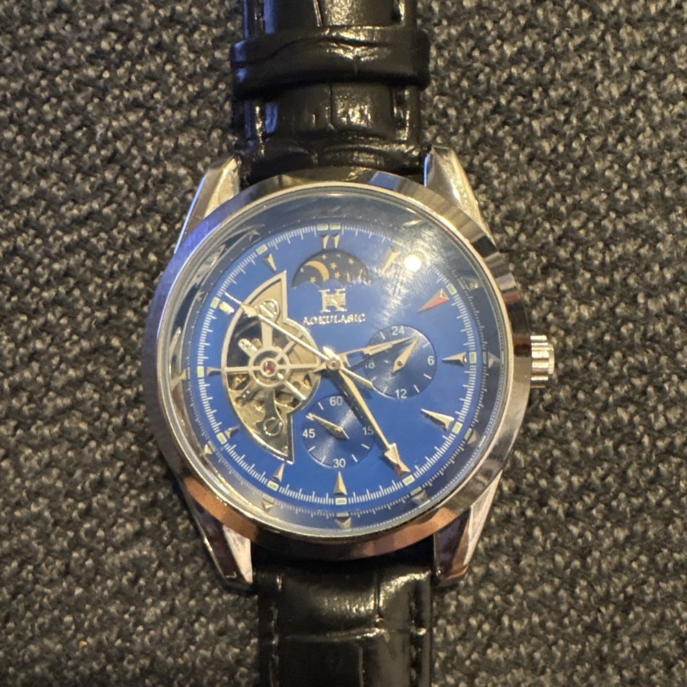 Akribos XXIV Automatic Skeleton Moon Phase Blue Dial Silver SS newBlack Leather