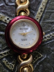 Waltham Diamond Quartz Wristwatch Round Red Face Silver and Gold Tone Elegant