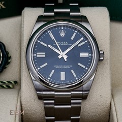 Rolex Oyster Perpetual 41 Blue Dial Ref. 124300 – Box & Papers