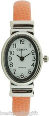 NEW GENEVA ORANGE METAL WRAPPED LEATHERETTE BANGLE CUFF OVAL DIAL WATCH