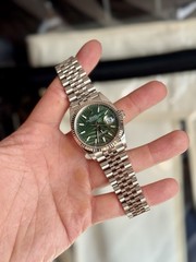 Rolex Datejust 126234 GREEN PALM MOTIF Silver Jubilee Fluted Bezel. DISCONTINUED