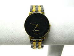 Black and gold tone Women’s Watch