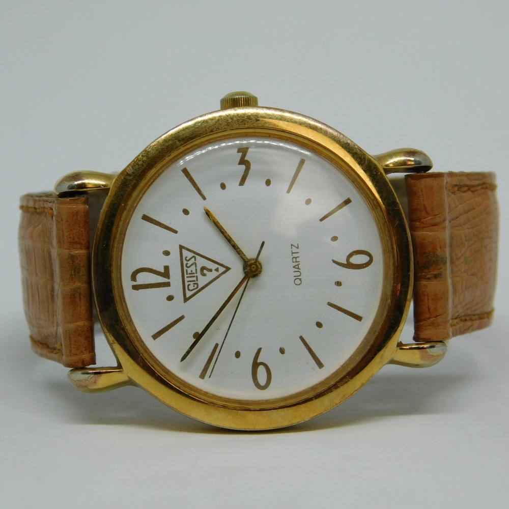 GUESS Gold Tone Case Quartz Analog Unisex Watch New Battery