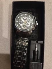 Skeleton Dial Day Indicator Men’s Wristwatch Black Dial Black Metal Band Analog