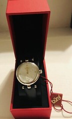 Burgi Women’s BUR197SSB Diamond Accented Flower Dial Silver & Black Leather