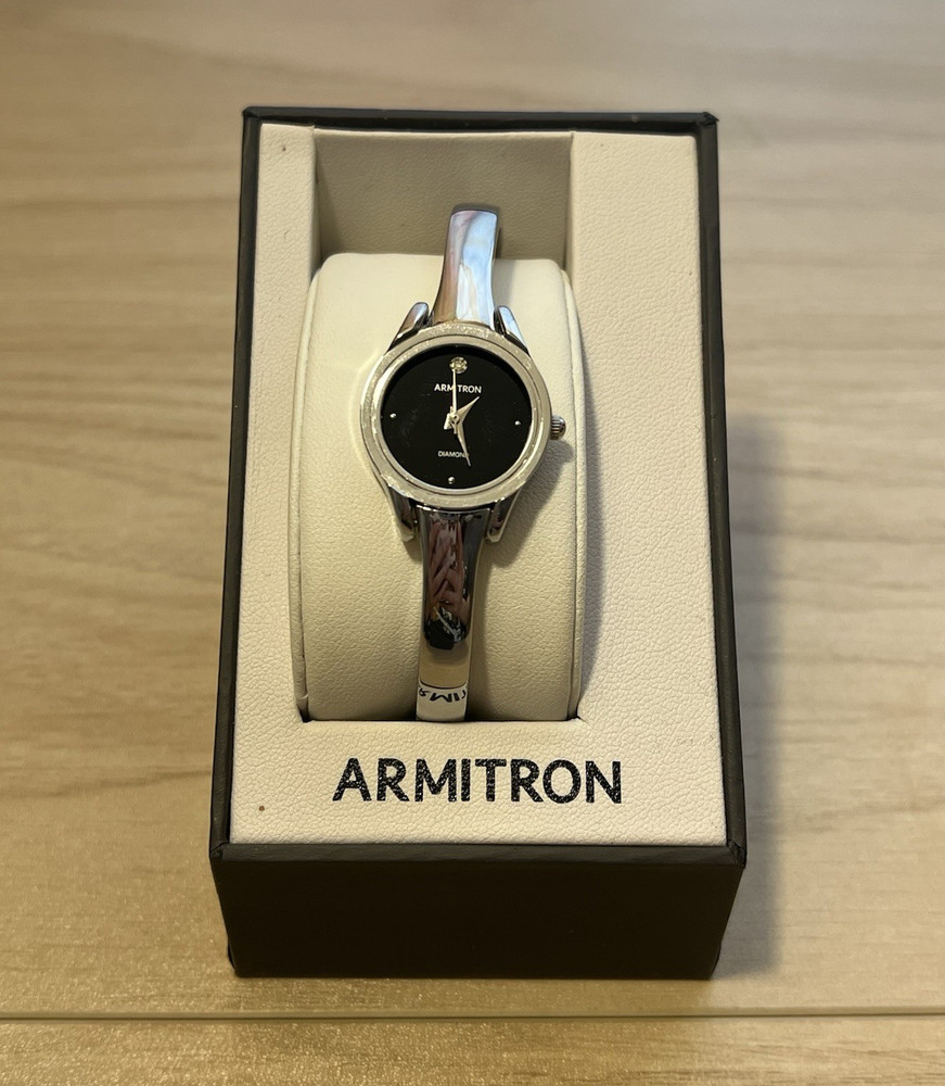 Armitron Women’s Quartz Analog Watch Diamond Accent Black Dial Silver Bracelet