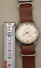 Vintage men’s Vostok 2214 mechanical watch with a date function.