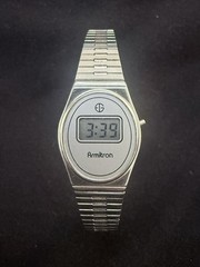 Armitron Digital Wristwatch Silver Tone Oval Case Silver Dial Metal Bracelet