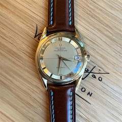 Universal Geneve, Polerouter Date, gold plated, 35mm case strap cream dial