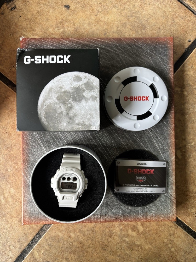 Casio Men’s G-Shock DW6900NASA237 Watch White Resin Case and Strap