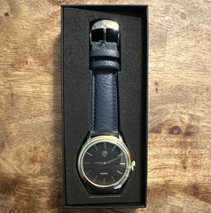 Quartz Analog Wristwatch Black Dial Stick Index Gold Tone Blue Leather w/ Box