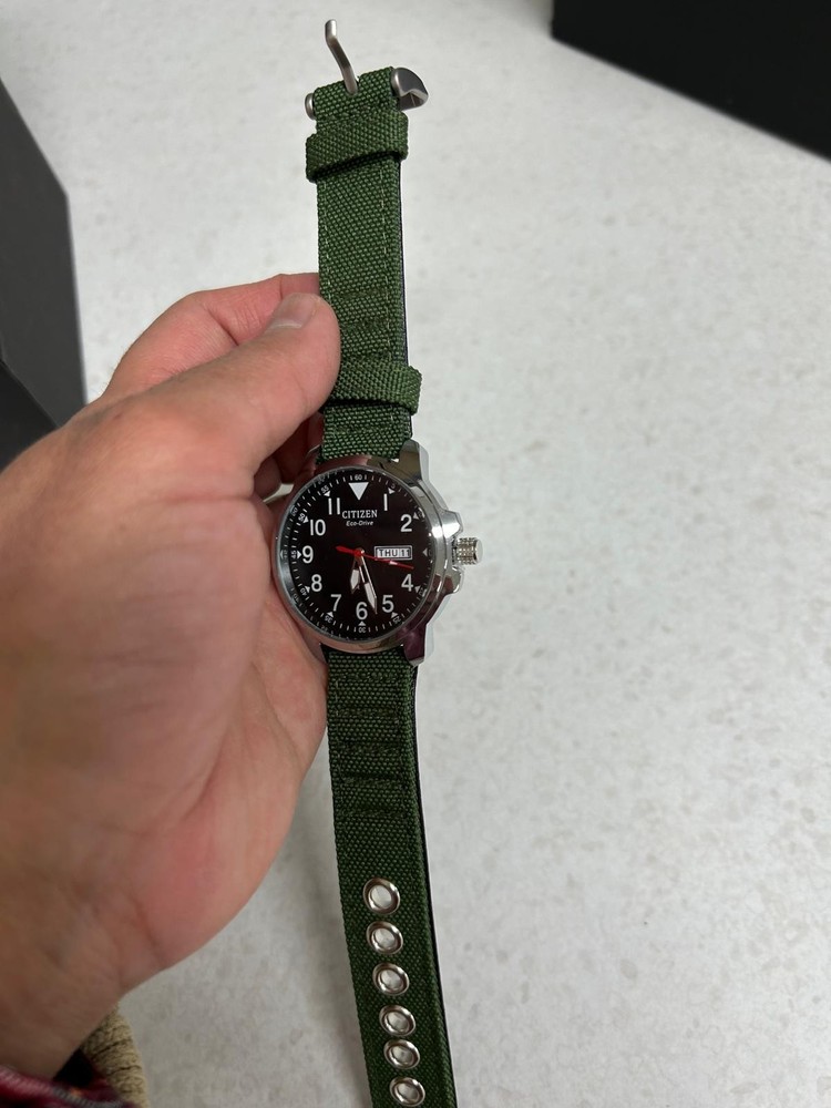 Citizen Men’s Eco-Drive Black Dial Green Strap Field Watch BM8180-03E fresh