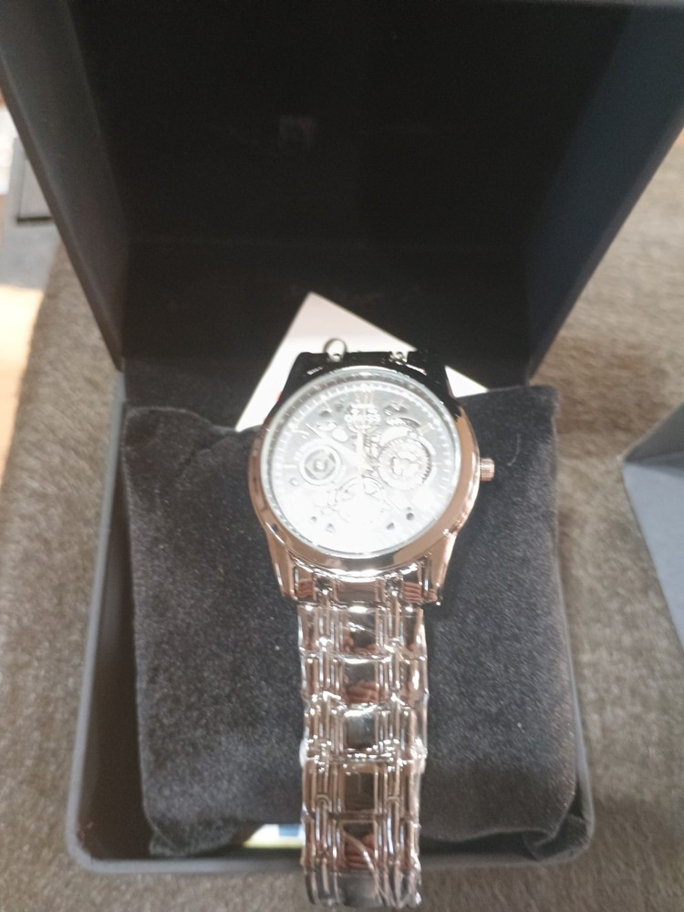 ORUSS Men’s Skeleton Quartz Watch Silver Tone Black Dial Stainless Steel Band