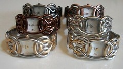 Women’s assorted finish cut work pattern fashion dressy/casual bangle watch