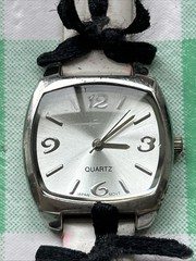 Silver Tone Black And White Band Women’s Quartz Watch