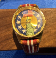 Patriotic Bicentennial Statue of Liberty Analog Wristwatch with Rotating Flag