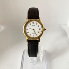 Working SEIKO EXCELINE watch, leather strap, round dial, Roman numerals.