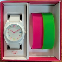Xhilaration watch with 3 interchangeable straps: white, pink, green. MSRP $19.99