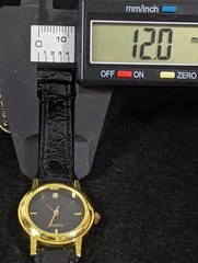 Womans Black Dial Round Gold Tone Case Black Leather Band Watch 6.75 In