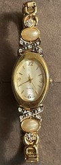 Vintage Women’s Quartz Wristwatch, Gold Tone Oval Case, Mother of Pearl Dial