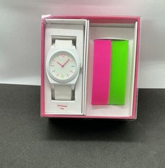 Xhilaration watch with 3 interchangeable straps: white, pink, green. MSRP $19.99