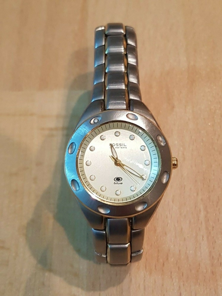 Fossil Blue AM-3304 Women’s Watch Analog Dial Silver Tone Case 100M/330FT WR