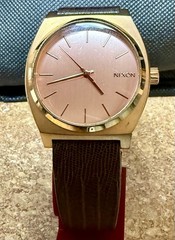 Nixon The Time Teller Minimal Rose Gold Dial Steel Case Brown Leather Strap 100m