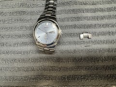Citizen Eco-Drive Quartz Analog Wristwatch Silver Dial Date 100M SS Band