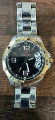 women’s Invicta specialty tritenite rotating bezel,black and copper dial NB