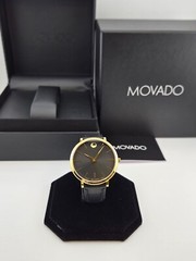 Movado Women’s Ultra Slim Black Dial Gold Tone Case Watch – 0607091 ($795 MSRP)