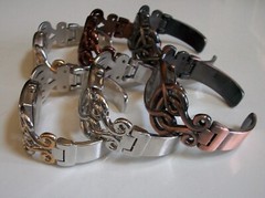 Women’s assorted finish cut work pattern fashion dressy/casual bangle watch