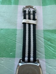 Women’s Silver Tone Black And White Band Quartz Watch