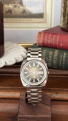 Orient AAA Deluxe Automatic 21J Sunburst Fumé Dial Cushion Case Watch 1970s