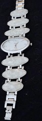 Vintage Xavier Women’s Quartz Silver Toned and mother of pearl color watch. Q