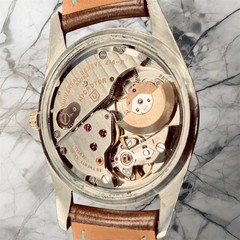 Universal Geneve, Polerouter Date, gold plated, 35mm case strap cream dial