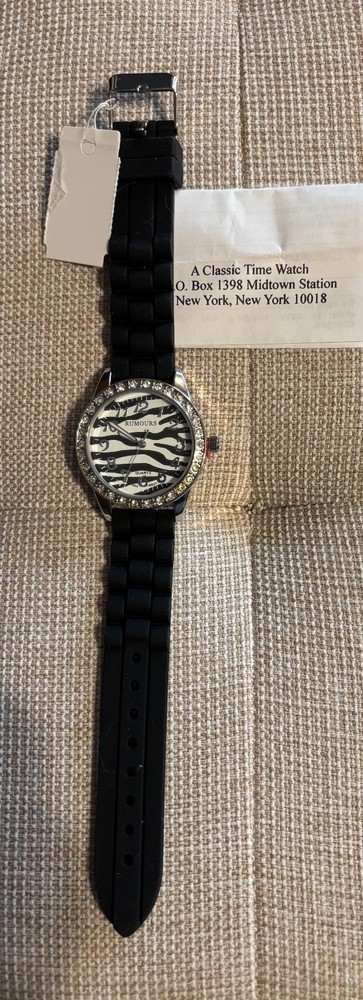 Ladies Rumours Silver Tone Sparkly Zebra Dial Black Rubber Band Watch Never worn