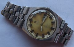 Tissot PR516 mens wristwatch steel case automatic run but need service
