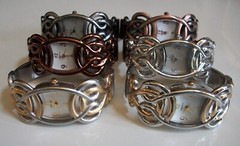Women’s assorted finish cut work pattern fashion dressy/casual bangle watch
