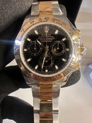 Rolex Daytona 116503 Silver and Gold Oyster Bracelet with Gold Bezel Watch Only