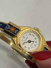Swiss made blue green red enamel flower peekaboo watch bracelet gold tone