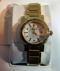 NIB Swarovski Octea gold color SS band watch- New battery READ
