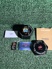 Casio G-SHOCK Digital Quartz Black/Gold Resin 200m w/ Box Manuals Papers