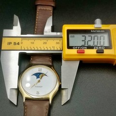 Vintage and Rare TISSOT Moonphase Unisex quartz watch. Mineral Crystal. F356